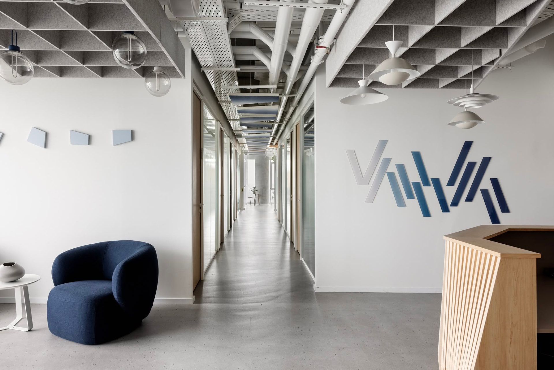 Variance office corridor with the sculptural wall mark